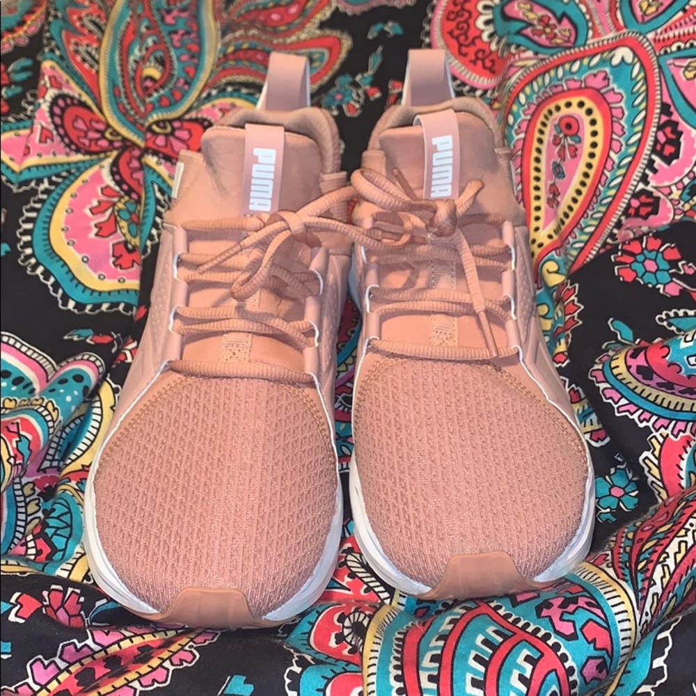 Pink Puma running shoes